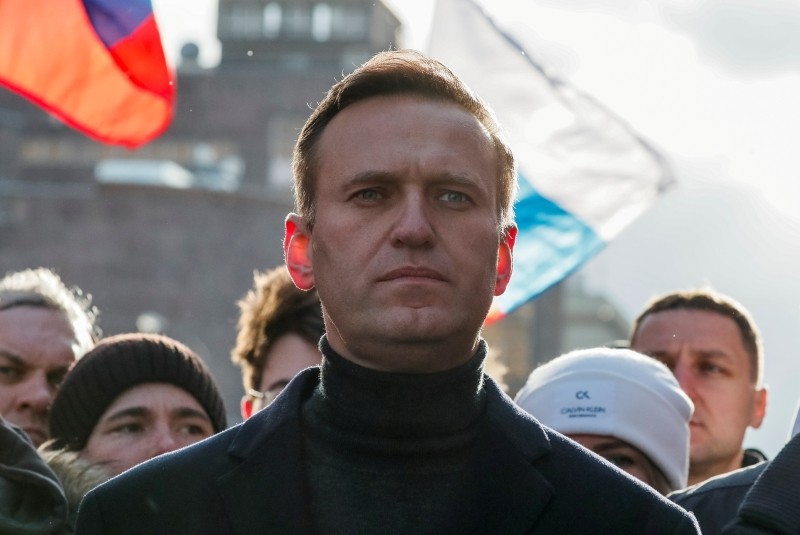 FILE PHOTO: Russian opposition politician Alexei Navalny takes part in a rally to mark the 5th anniversary of opposition politician Boris Nemtsov's murder and to protest against proposed amendments to the country's constitution, in Moscow, Russia February 29, 2020. REUTERS/Shamil Zhumatov -/File Photo